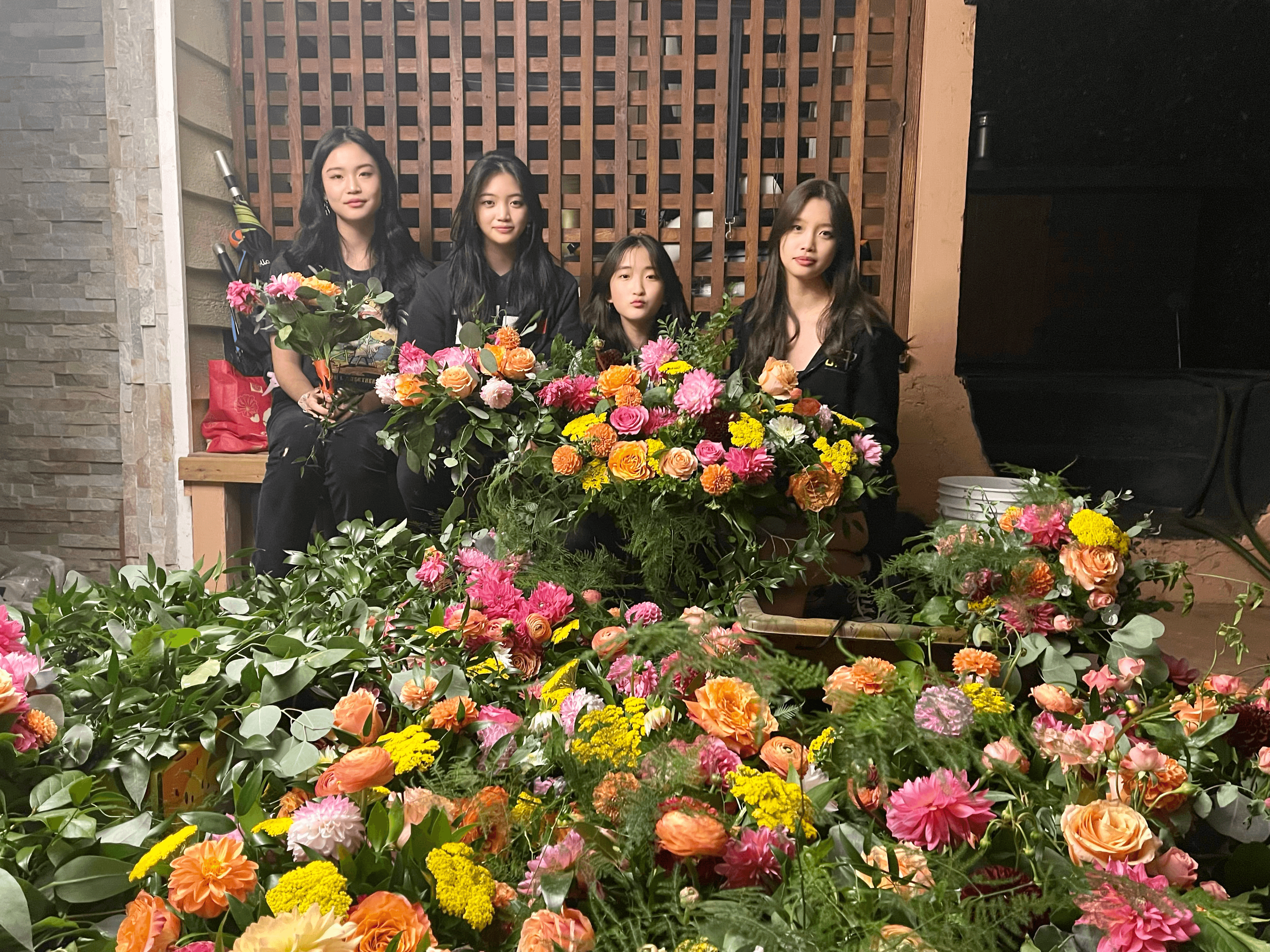 Repeat Floral volunteers sorting and repurposing flowers